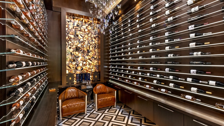 Inside Mark Wahlberg's new $37M Florida sanctuary as celebrities continue exodus from California 12 Florida home luxury wine room