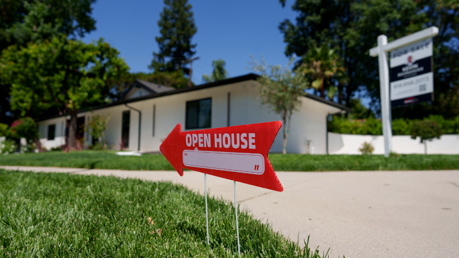 Bill Ackman to unveil plan for mortgage giants Fannie Mae and Freddie Mac this week 9 A home is seen in California with a an "open house" sign in front of it.
